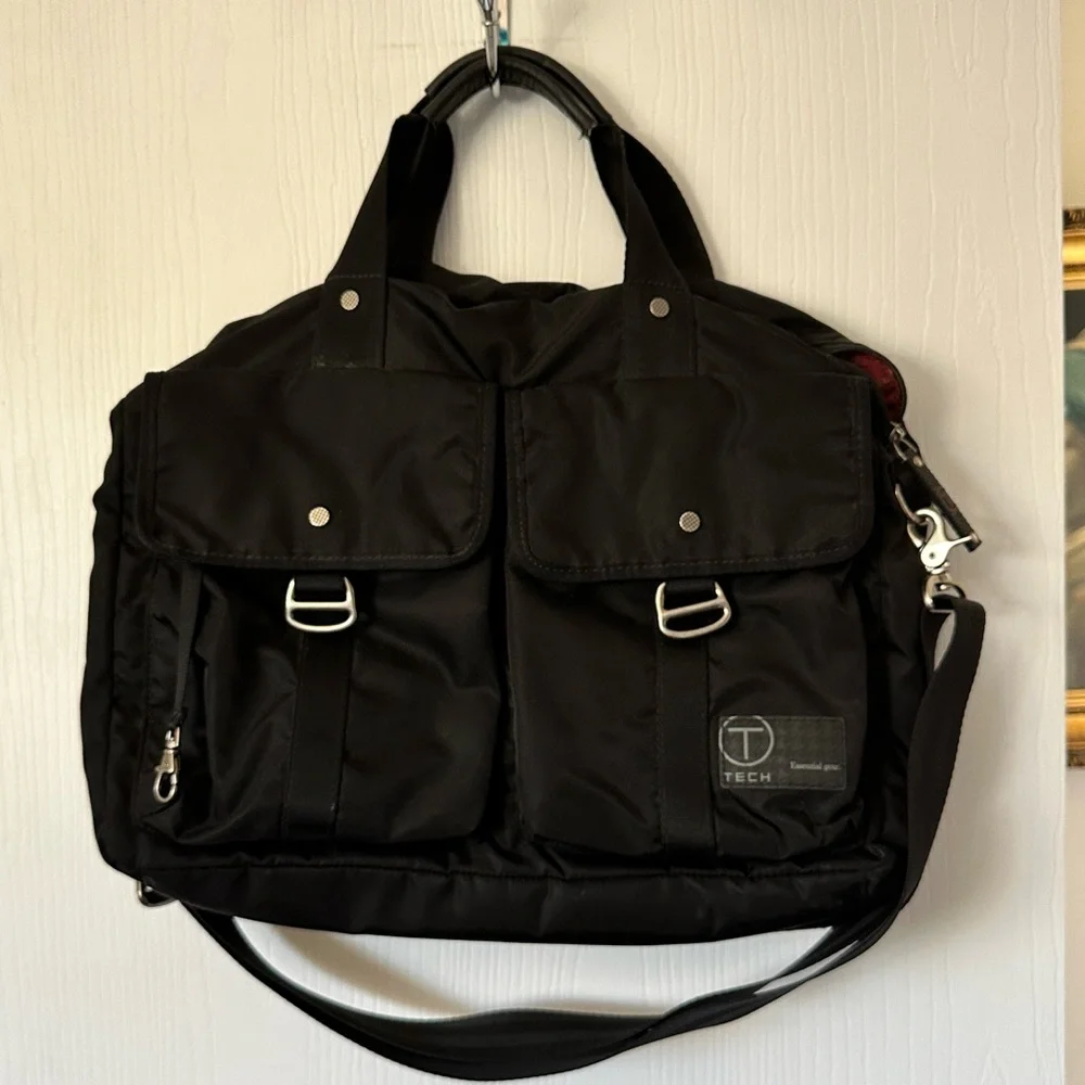 Vintage Tumi laptop/crossbody bag. Black with red lining, great find!